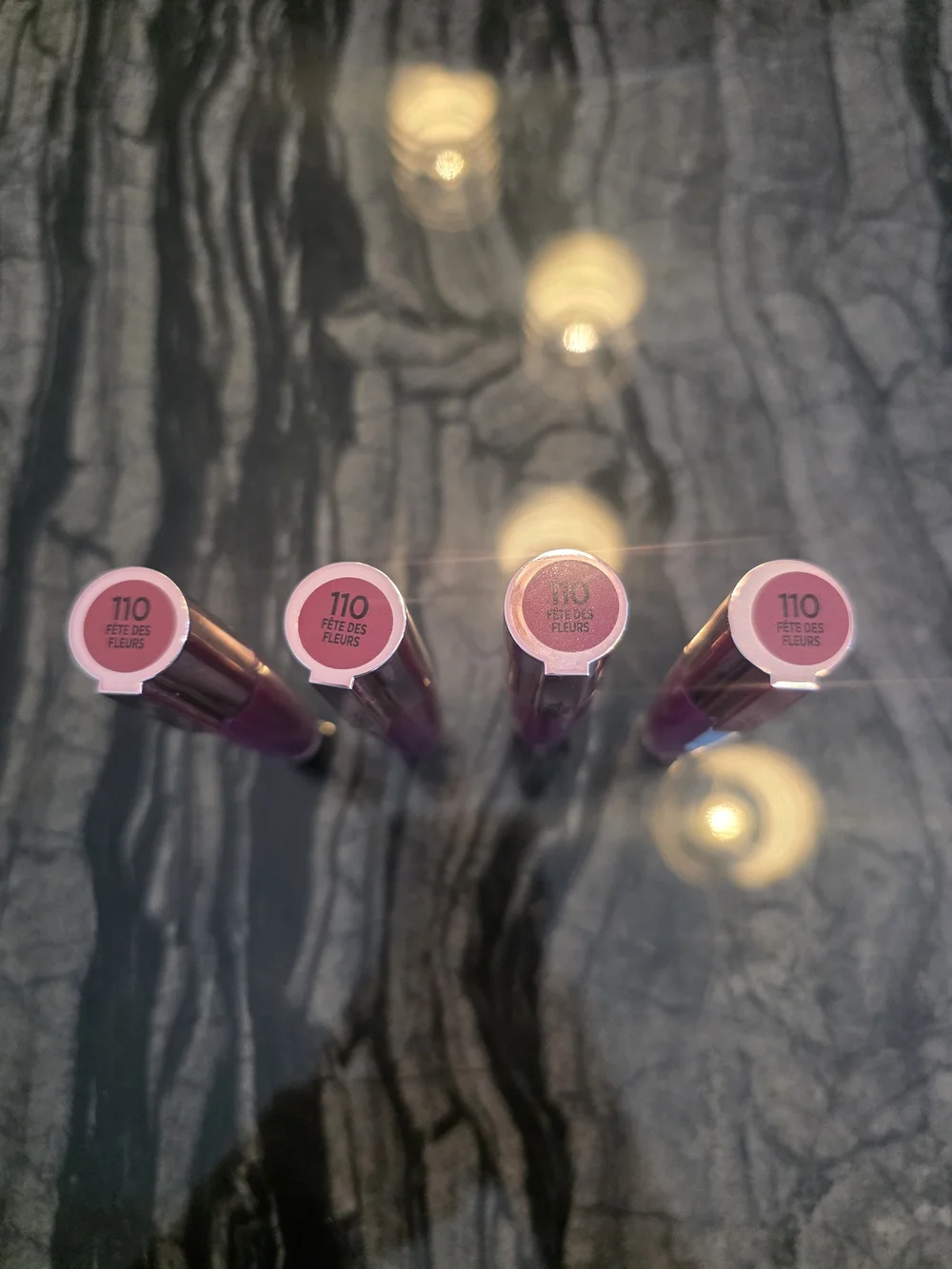SET OF 4 NWT L'Oreal Liquid Lip Gloss in Fete de Fleurs Retails @$12.99 ea.